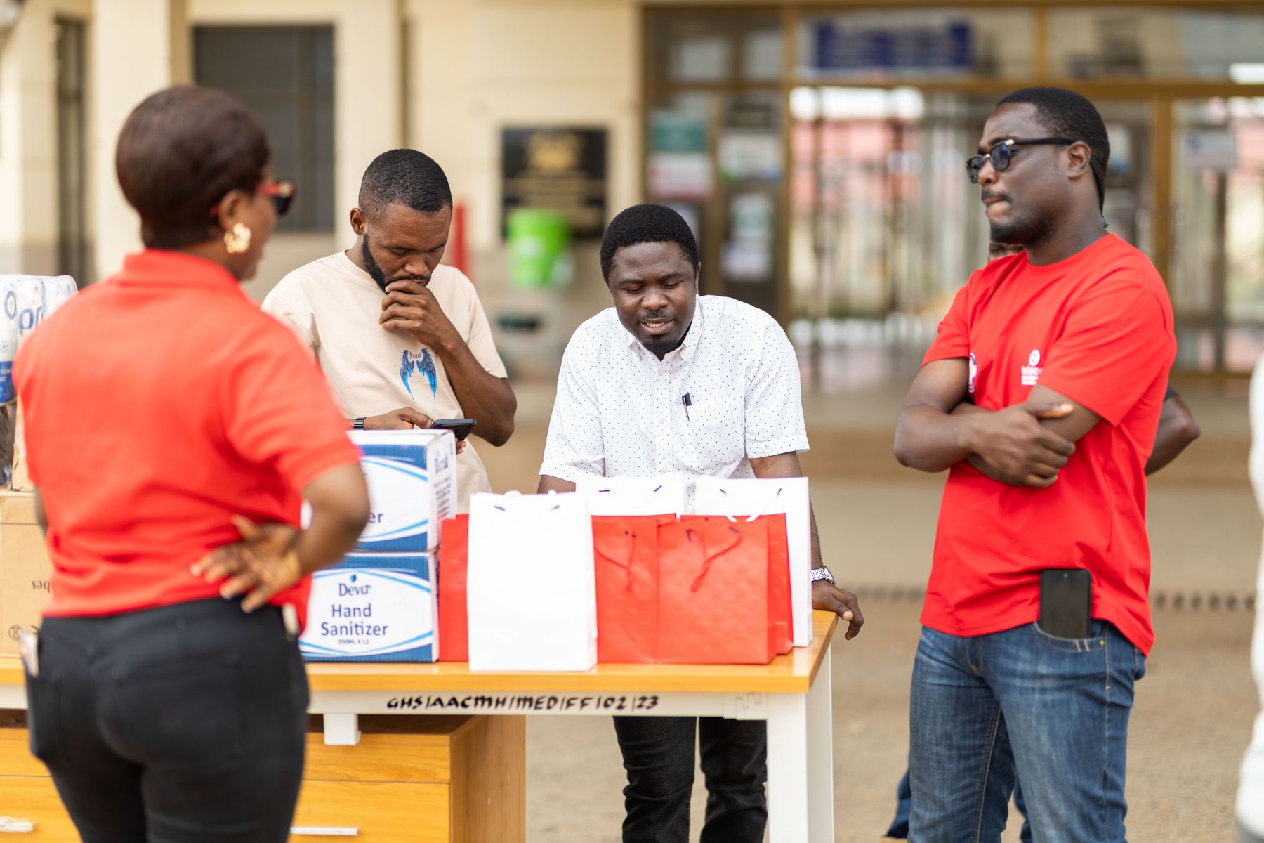 Black volunteers working together at a community service event